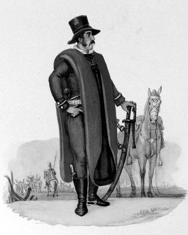 Gaúcho con poncho y sombrero junto a su caballo